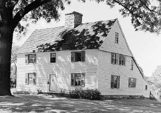 The Comfort Starr House, a colonial saltbox with a long sloping rear roof